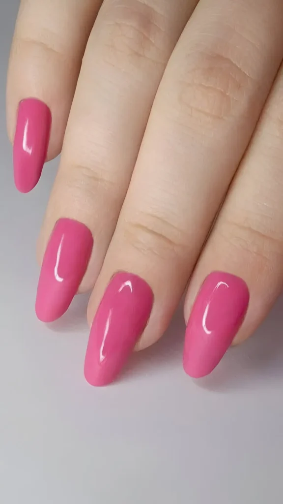 Cute rose pink nail design with minimalist thin white cuticle line accent.