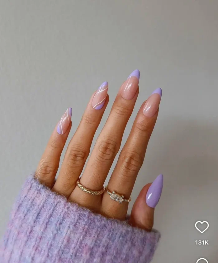 Almond-shaped nails with a deep plum gloss purple nail design, showcasing a high-shine, classic look.