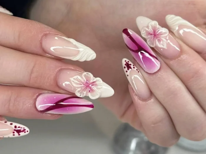 Stunning examples of 3D flower nails, featuring artistic and sculptural floral manicure ideas.