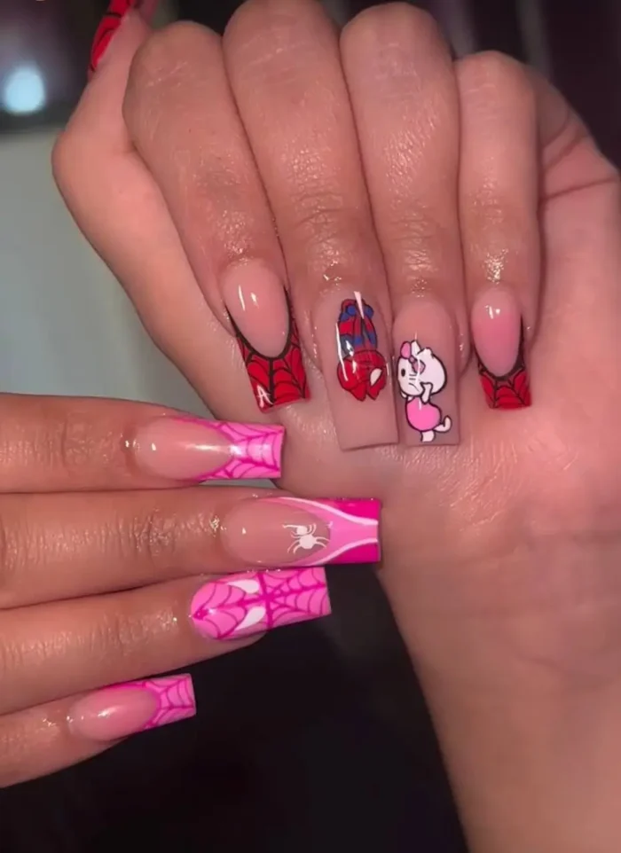 Fun and fearless pop-culture nail art on long square nails featuring Hello Kitty and Spider-Man in a delightful mashup.