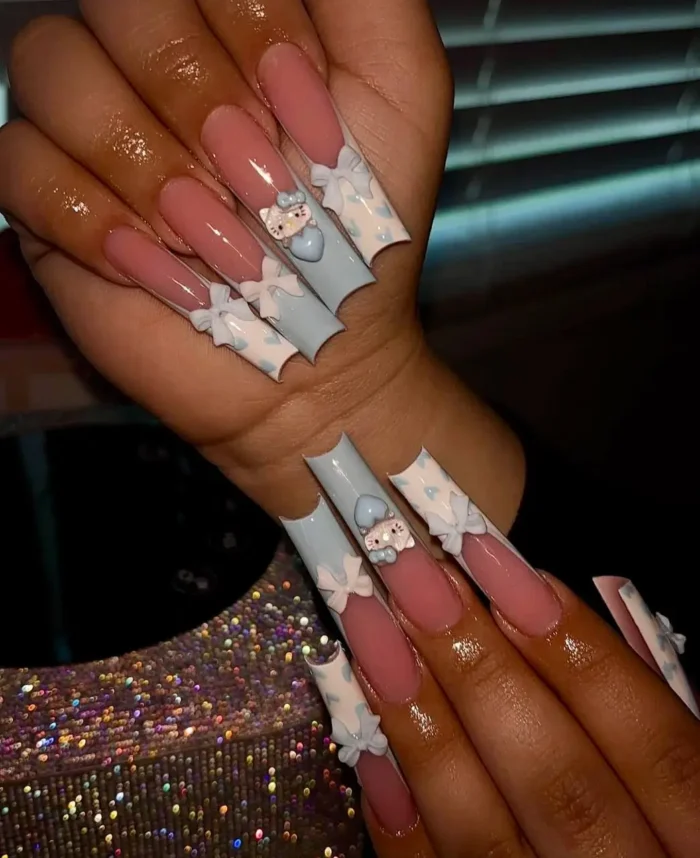 Long square nails with baby blue French tips, cloud details, 3D character charms, and white bows.
