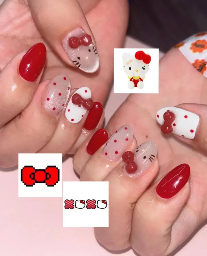A stylish Hello Kitty tribute manicure with minimalist character art, classic red polish, and charming 3D red bow details.