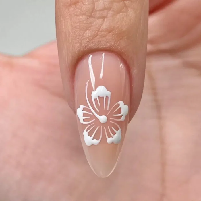 Step six of a hibiscus nail tutorial, showing an elegant, curved white line being drawn from the center to form the stamen.